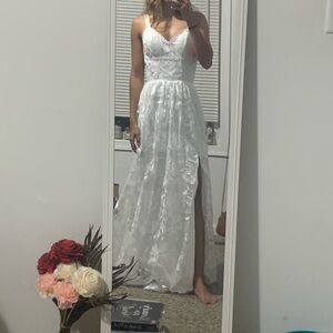 Brand new. Size 2 lace A-line wedding dress.